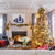 Warm living room with fireplace and brightly lit Christmas tree. Interior design by Jamie Merida.